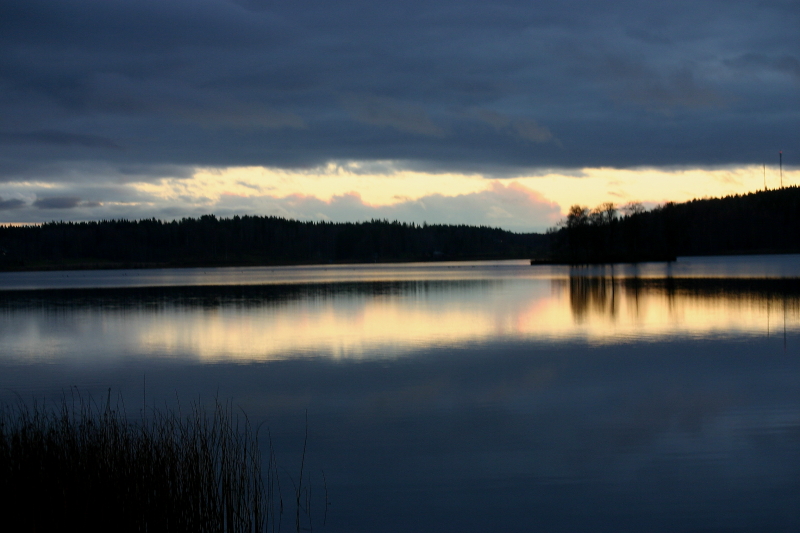 Lindesjön med solen som går ner