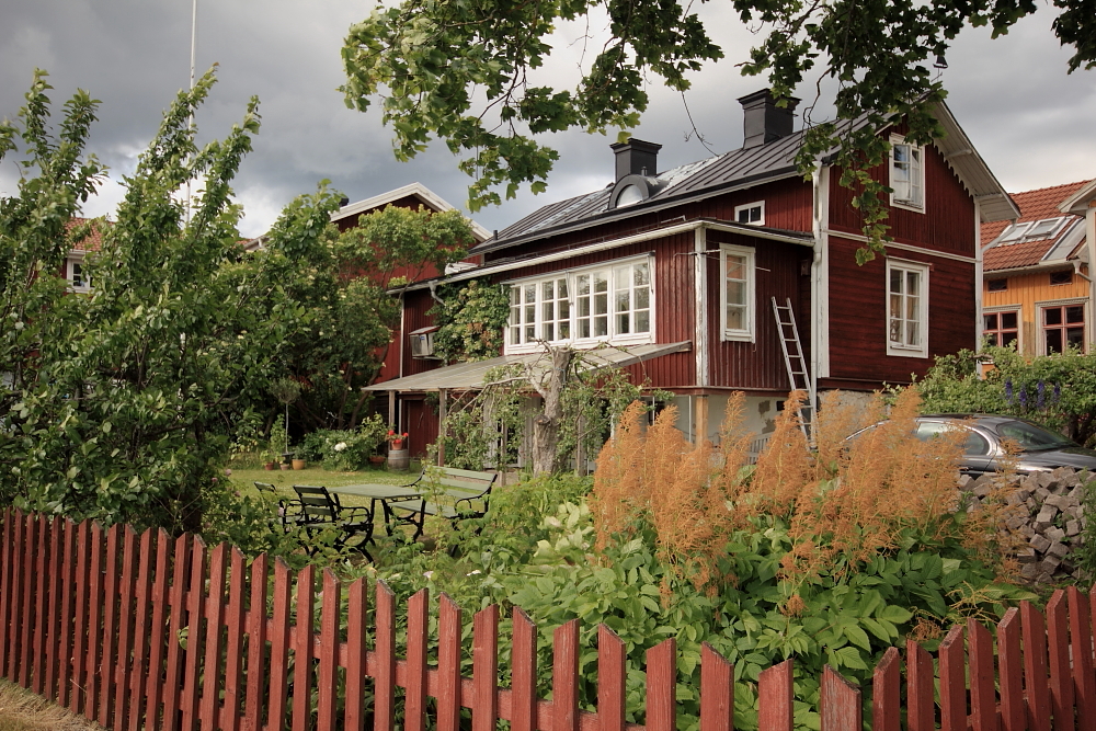 Huset bakom staketet