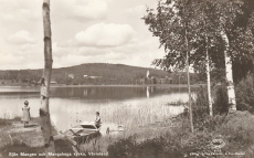 Sjön Mangen och Mangskogs Kyrka, Värmland 1953 Sjön Mangen och Mangskogs Kyrka, Värmland 1953